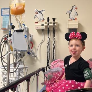 Child receiving blood transfusion