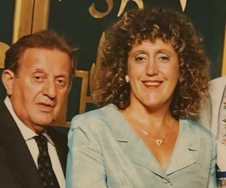 Woman with father at formal event