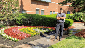 Bert Rodrigues outside at Head Office