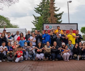 Partner group in front of Canadian Blood Services sign