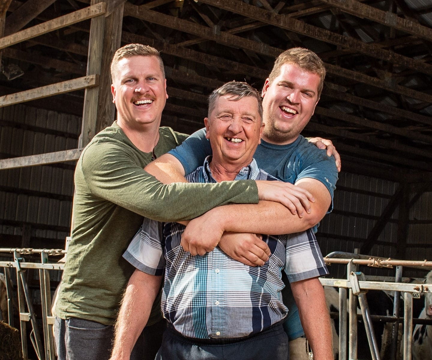 Blood and plasma recipient being hugged by his sons