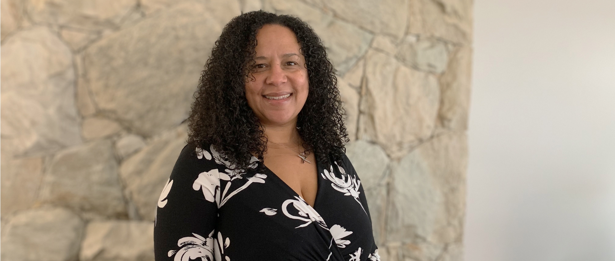 Anika McDonald, a Black employee at Canadian Blood Services holds a branded #BloodForLife photo frame. Anika is proud to be contributing to her organization’s efforts to promote diversity and inclusion.