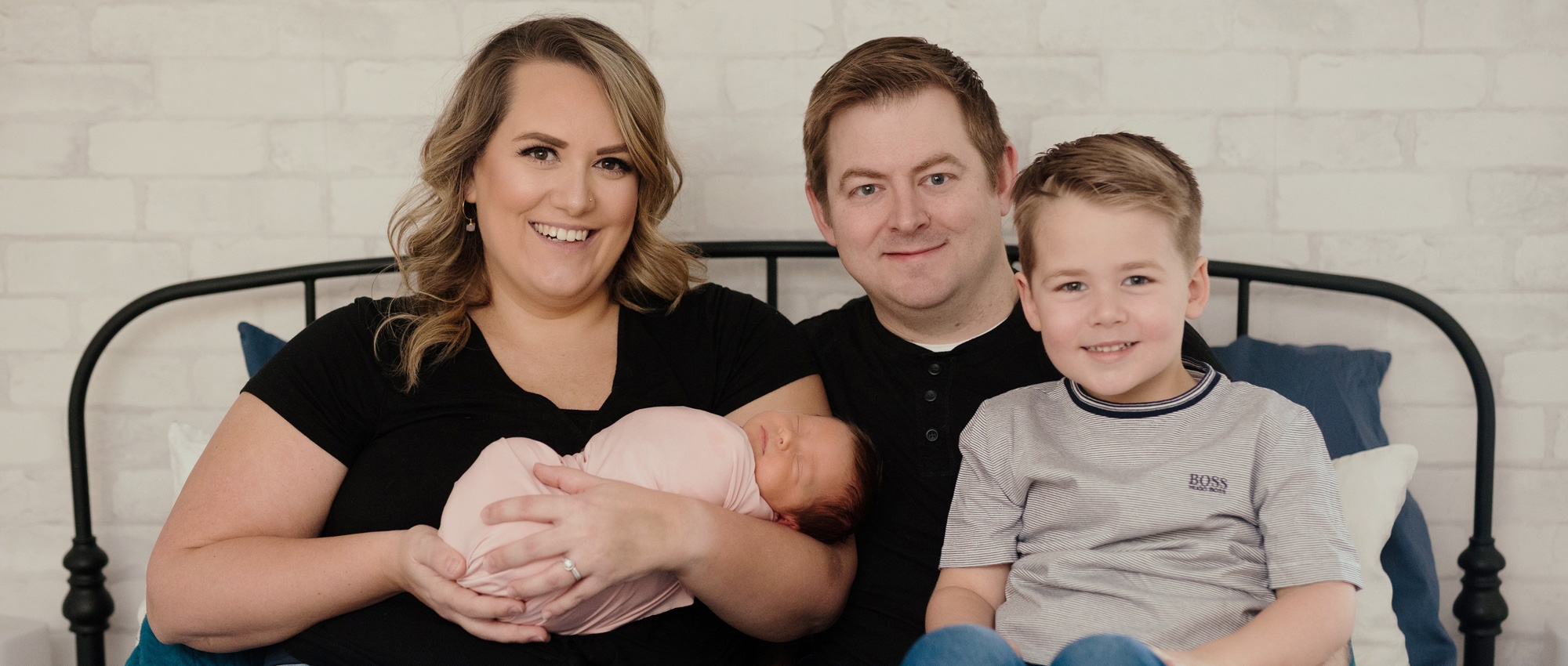 Cord blood donor Kelsey Koch and her family with their newborn baby.