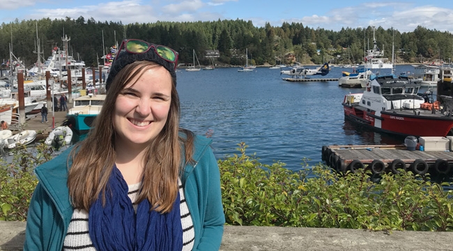 Young woman  at a marina